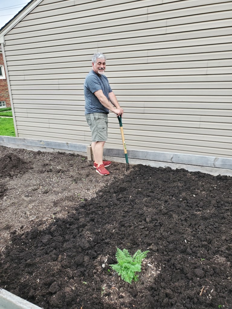 Joe prepping the garden.