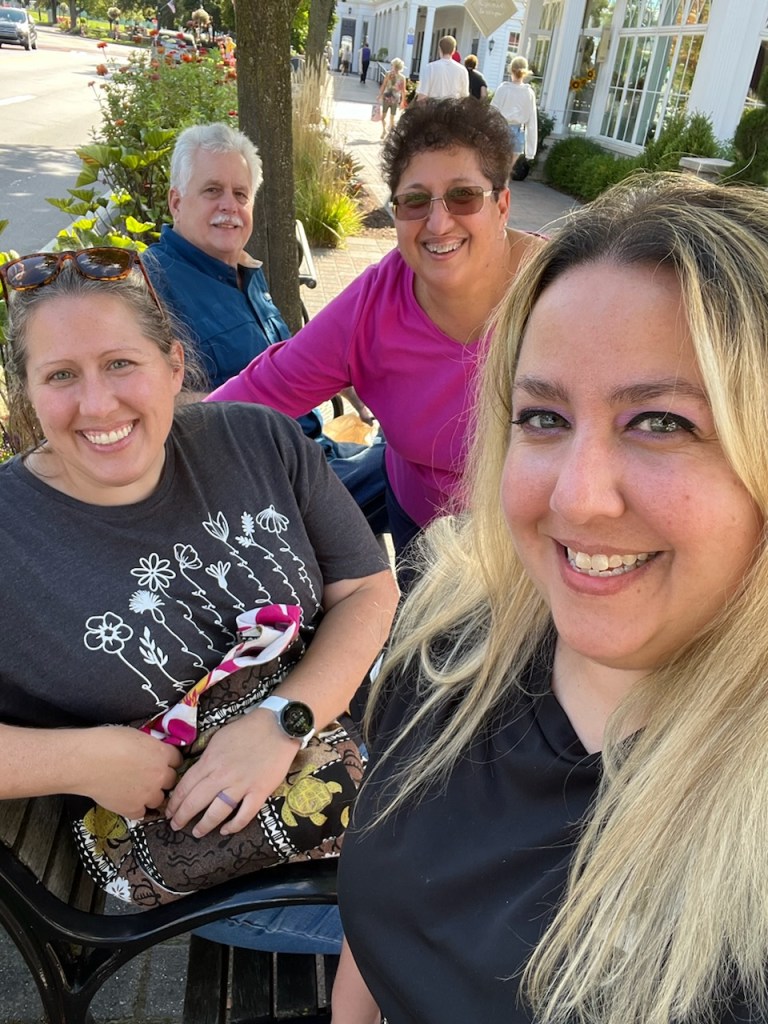 Becky with her dad, mom, and sister in Frankenmuth.
